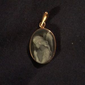 White Angel on blue pendant.
